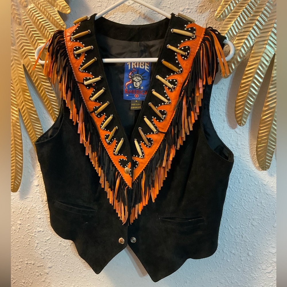 Beautiful leather vest and chap set ! Size 12 vest and chaps waist is 32